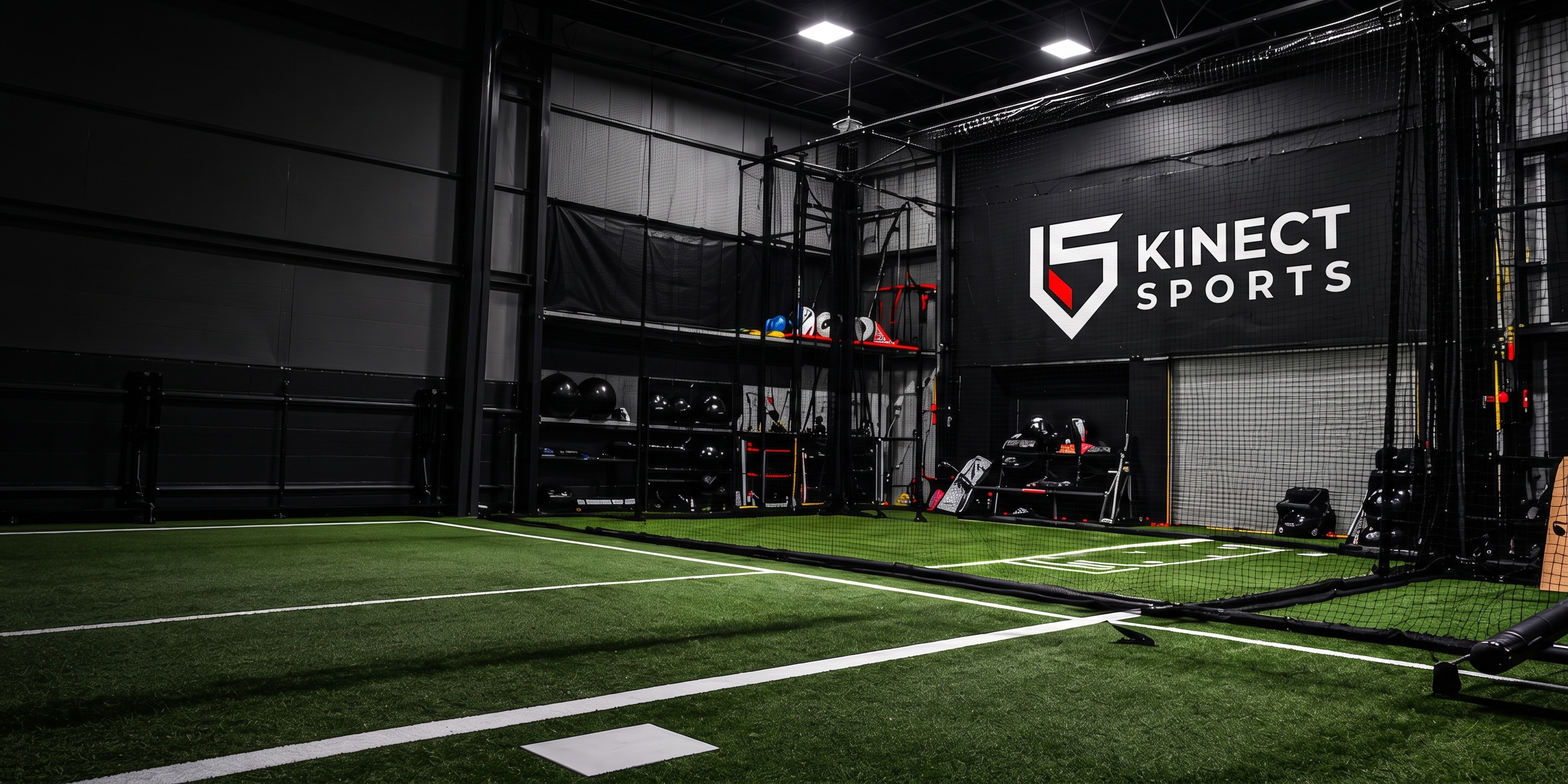 The Kinect Sports turf and cage bay, looking toward the branded back wall