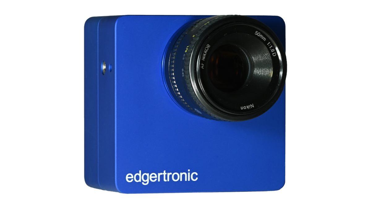 The blue Edgertronic SC1+ camera body with a Nikon 50mm lens mounted