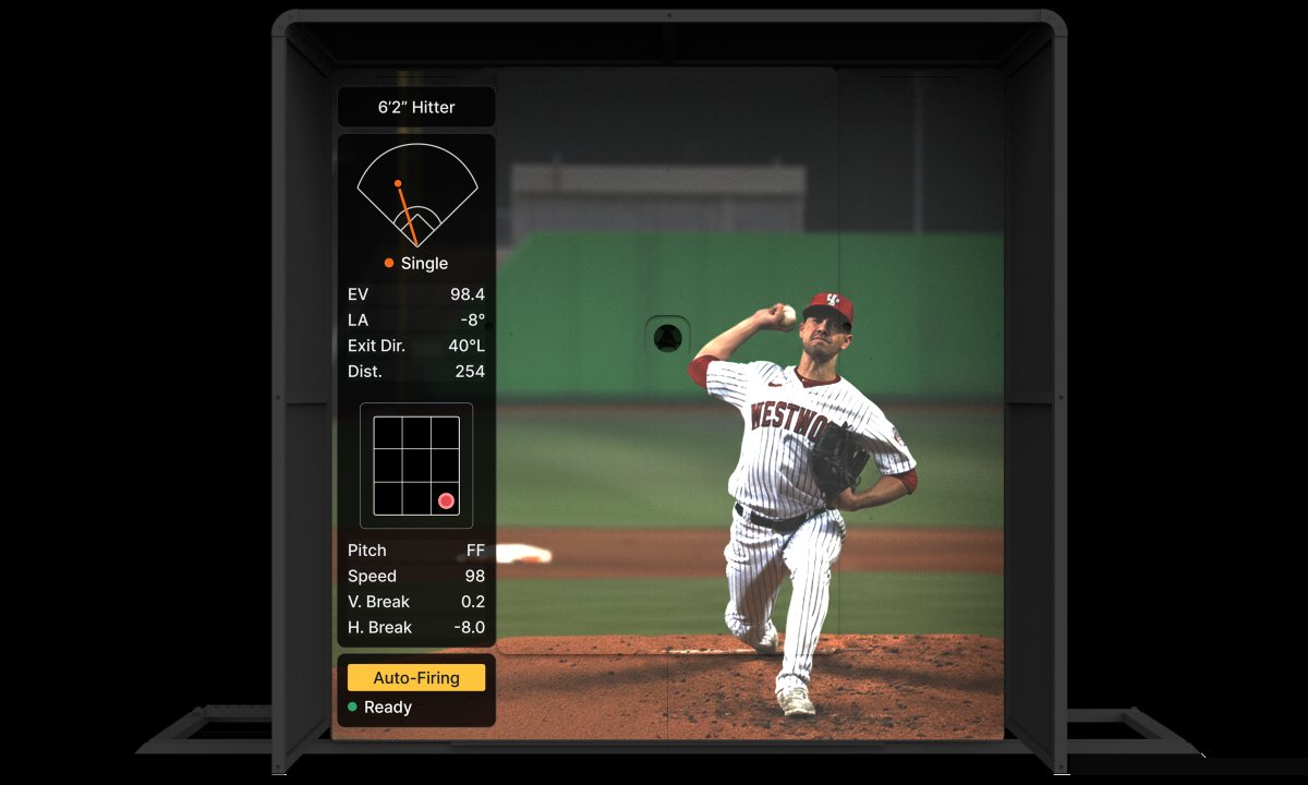 The Trajekt Arc, its screen showing a pitcher mid-delivery beside live pitch data